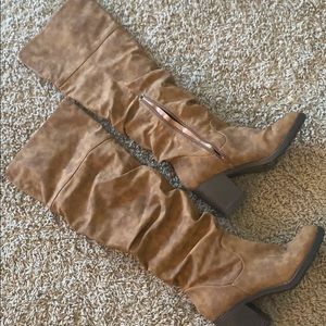 Knee high heeled brown boot